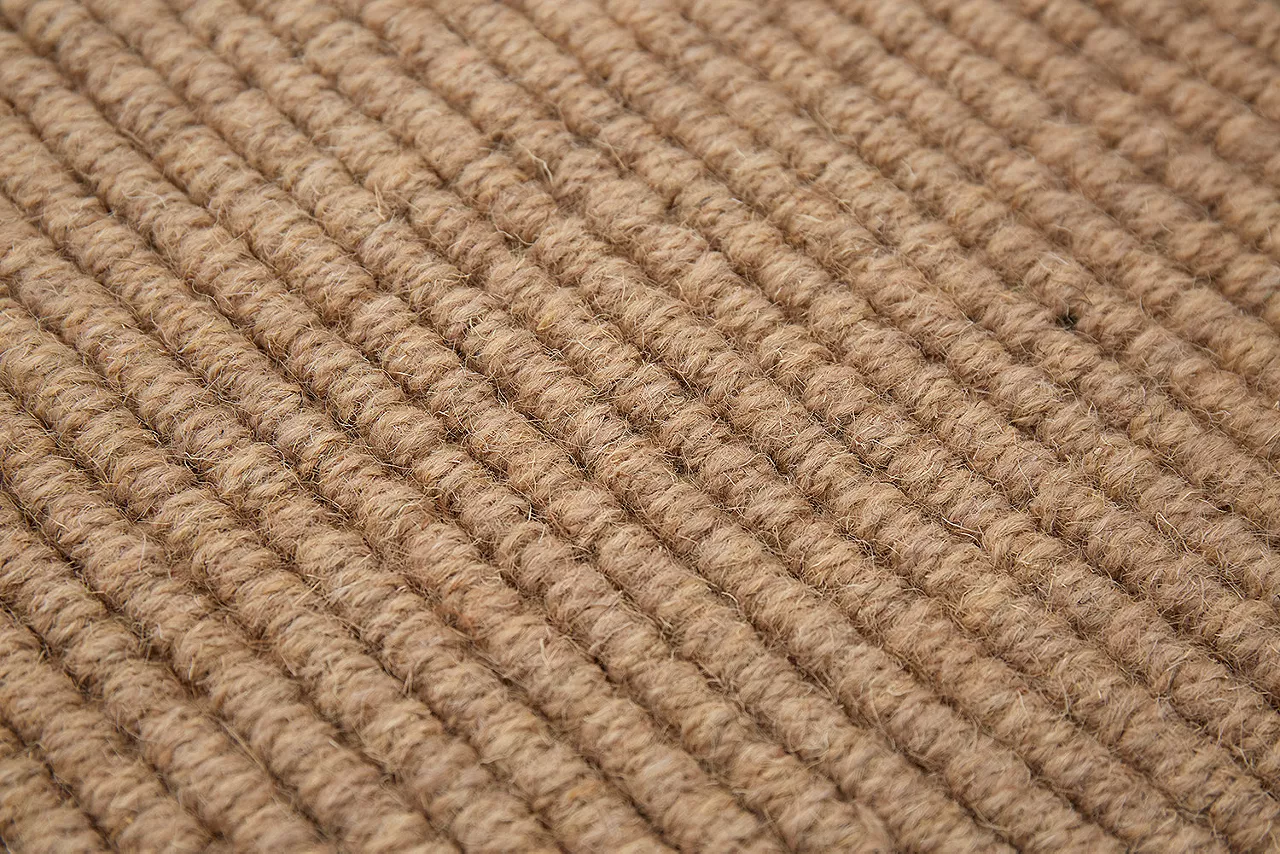 Detailed shot of a natural fiber wool rug